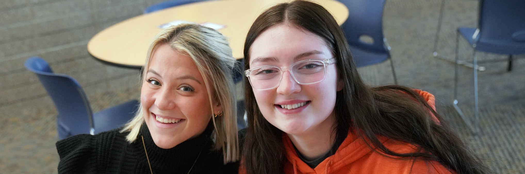 two students smiling