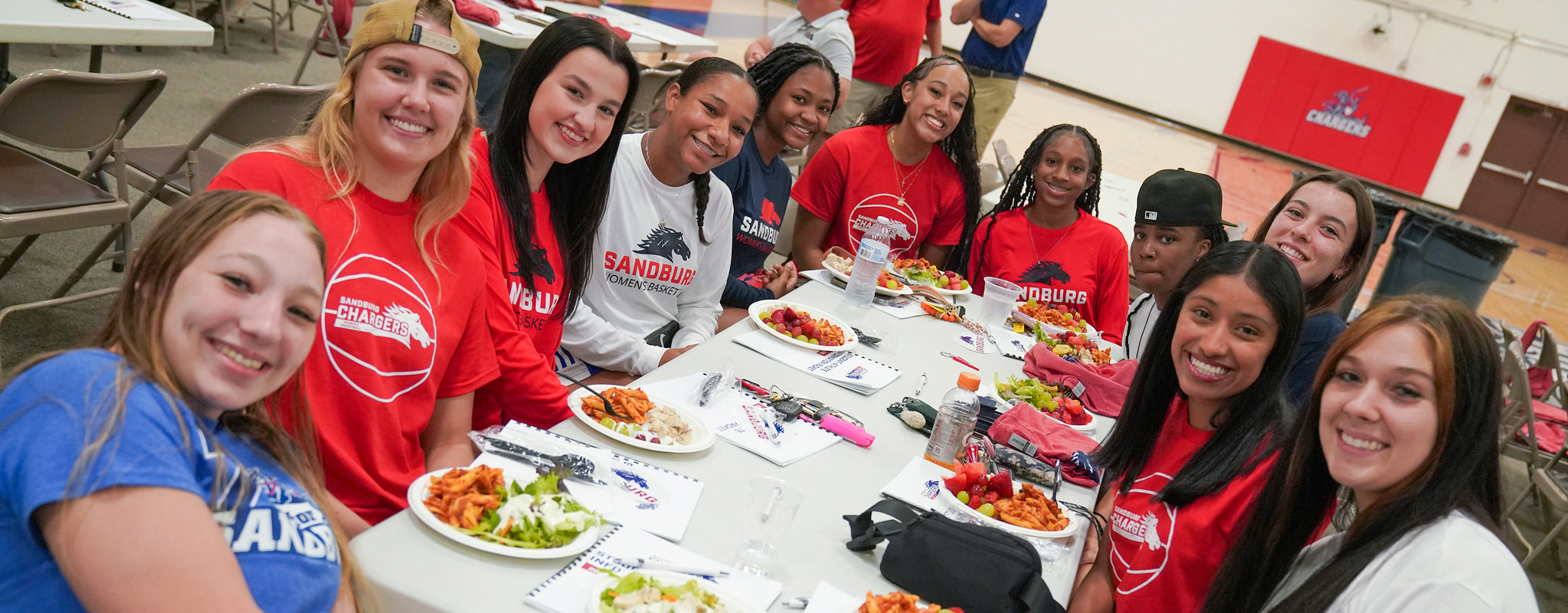 students smiling during lunch