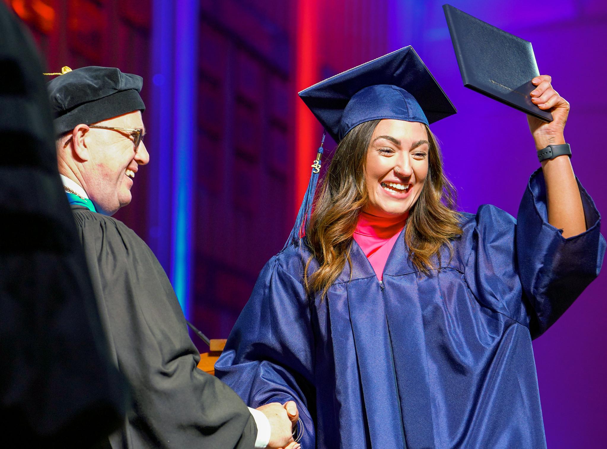 Student receiving her diploma