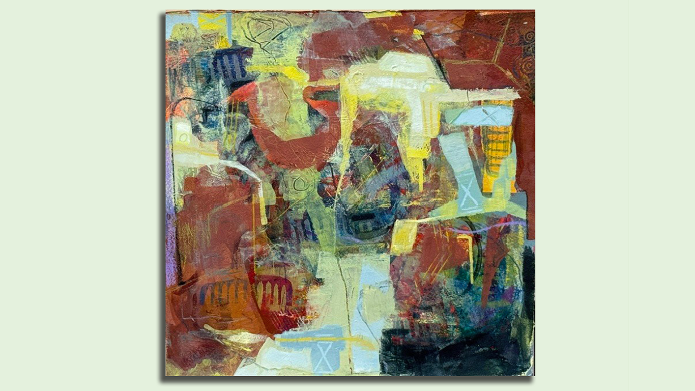 A abstract painting, with lots of reds and yellows.