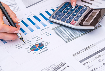 women using a calculator.