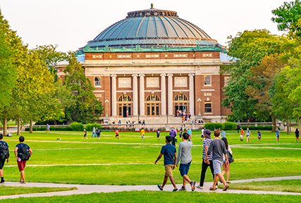 campus quad with students walking.