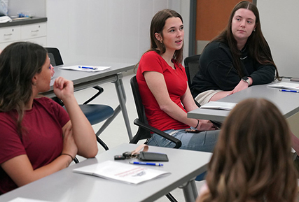 students in class having a discussion.