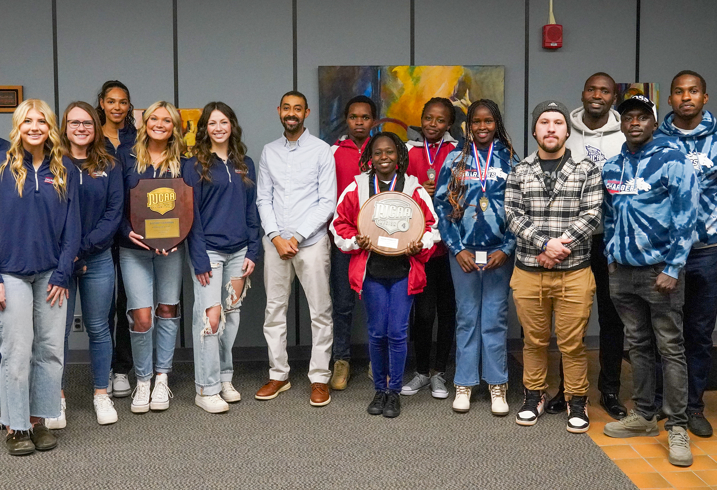 Volleyball and cross country teams at board meeting