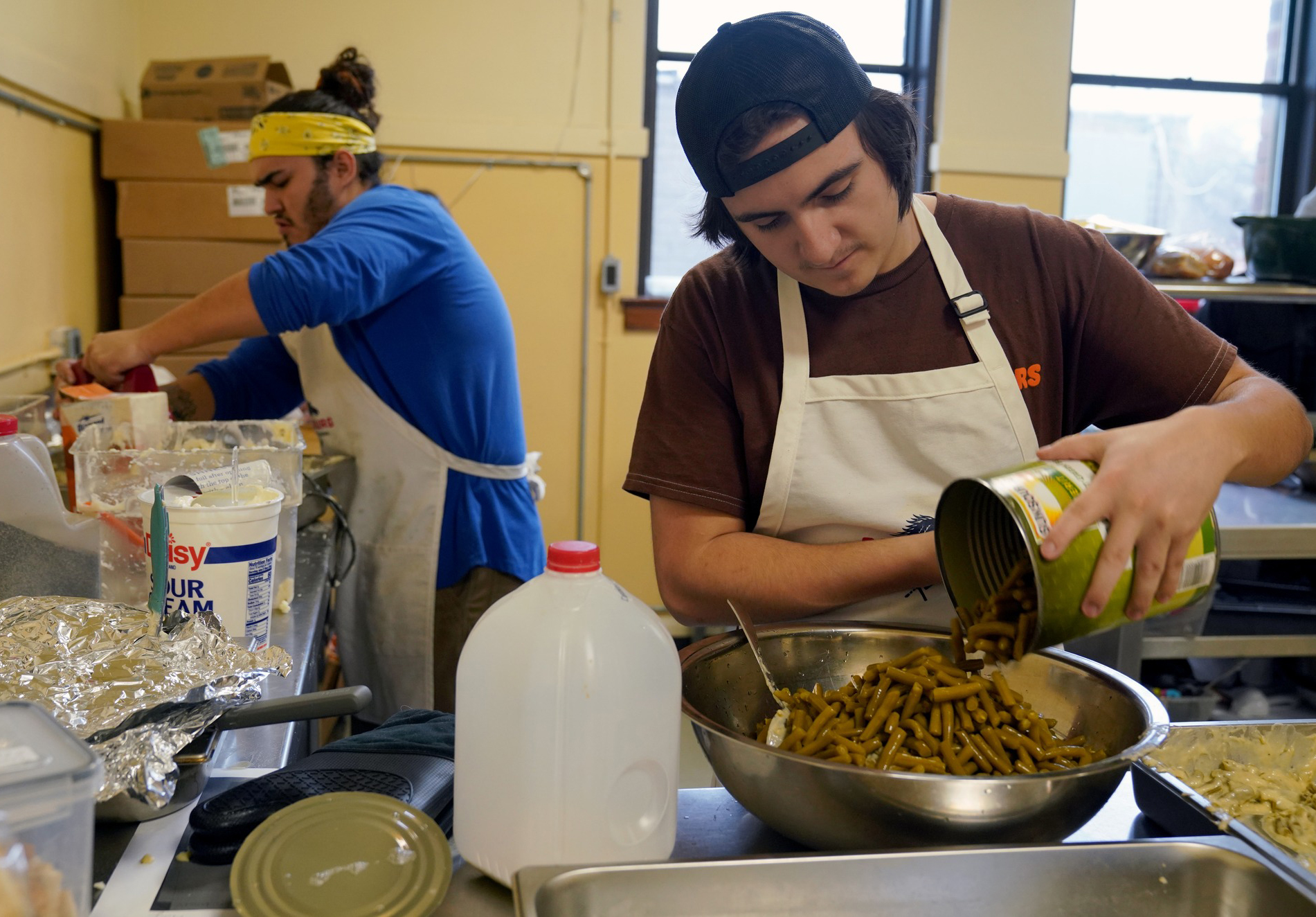 Culinary training students preparing meals.
