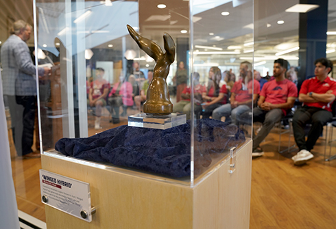 'Winged Hybrid' in display case during dedication ceremony