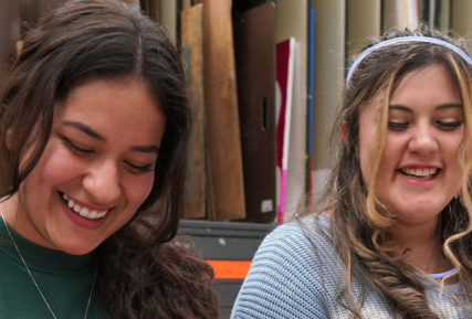 Two Sandburg students laughing