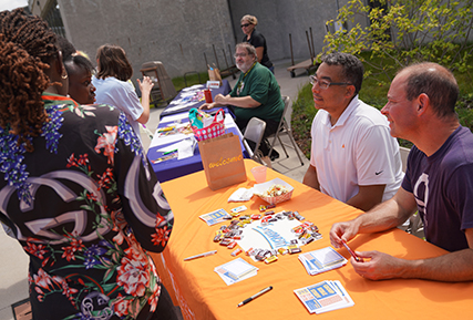 students at fall fest talking.