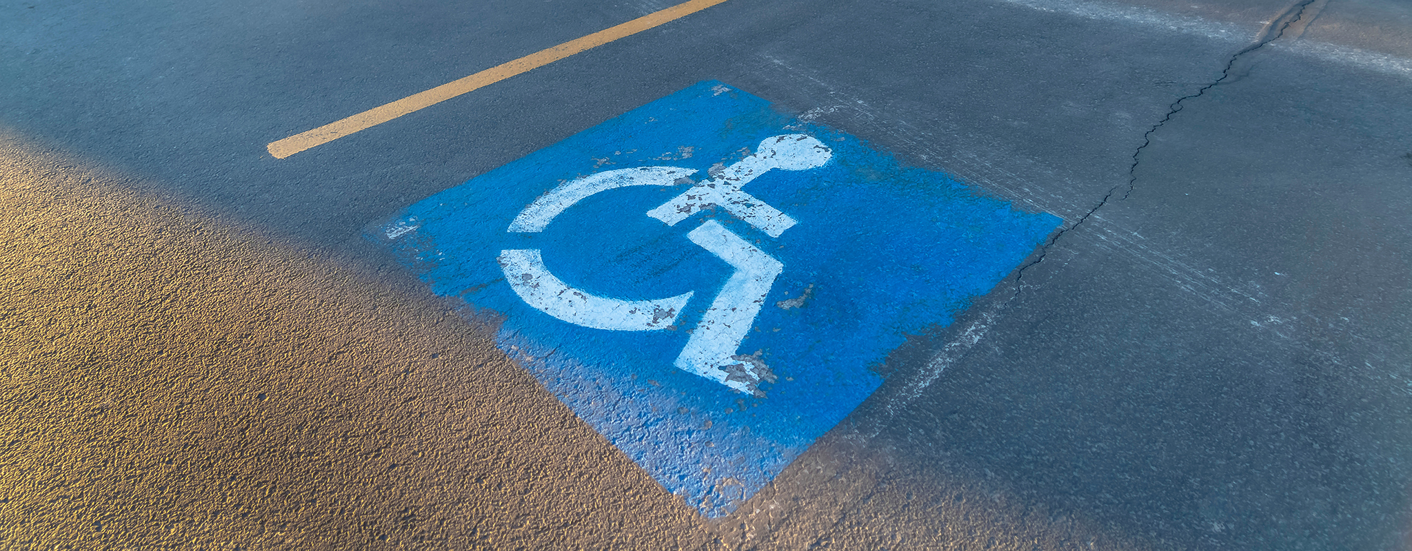 parking lot with a handicap sign.