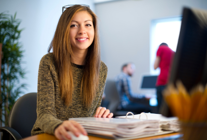 A woman sitting at a desk