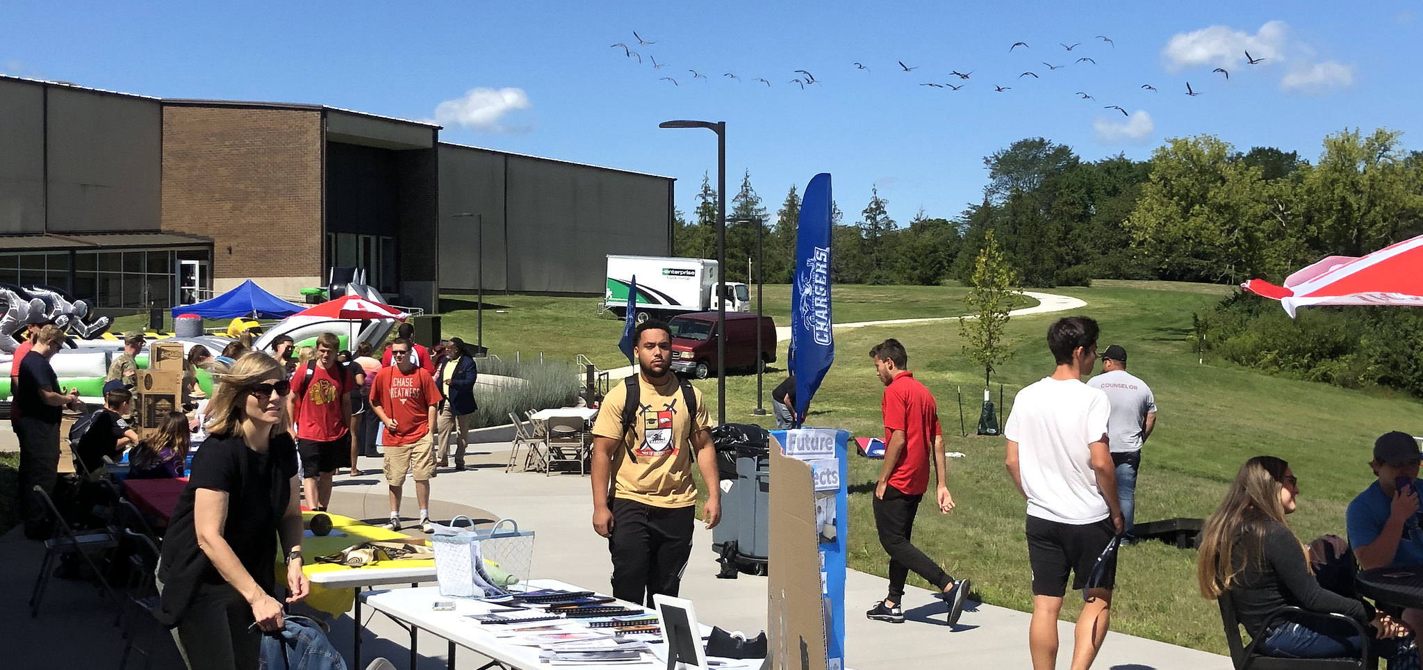 students on patio at spring fest.